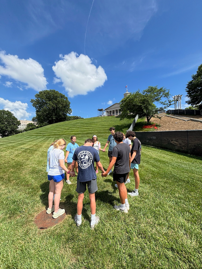 Hands together in community